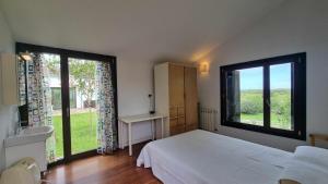 Ένα ή περισσότερα κρεβάτια σε δωμάτιο στο Casa vacacional el Pandu