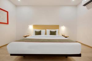 Postel nebo postele na pokoji v ubytování Hotel New City Lite