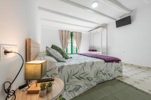 Posteľ alebo postele v izbe v ubytovaní Bettatur Apartaments Rera Sant Domenech