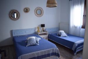 Postel nebo postele na pokoji v ubytování Platamon Boho Apartment- Με θέα την θάλασσα