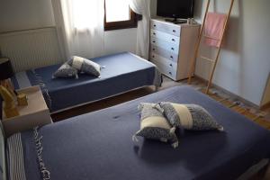 Postel nebo postele na pokoji v ubytování Platamon Boho Apartment- Με θέα την θάλασσα