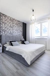 Katil atau katil-katil dalam bilik di Apartament Wanessa