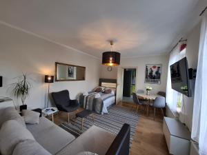 Posteľ alebo postele v izbe v ubytovaní Apartament Nectar Pond