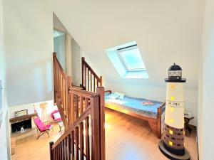 Ένα ή περισσότερα κρεβάτια σε δωμάτιο στο Le Ligno, Maison Néo-bretonne mer et plages