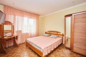 Postel nebo postele na pokoji v ubytování Arkadia