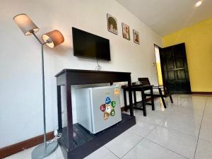 TV a/nebo společenská místnost v ubytování KK Hotel