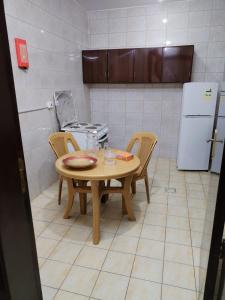 Kuchyň nebo kuchyňský kout v ubytování العييري للشقق المخدومة حائل 3