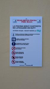 Et logo, certifikat, skilt eller en pris der bliver vist frem på Villa Liliana Your Private Oasis with Pool + 50 billeder