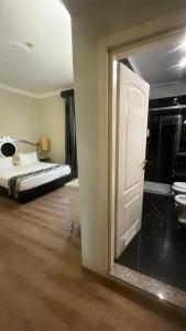 A bed or beds in a room at Zanhotel Tre Vecchi