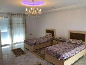Llit o llits en una habitació de dar chebeb kelibia