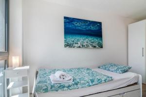 Postel nebo postele na pokoji v ubytování Blauer Seestern