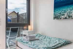 Postel nebo postele na pokoji v ubytování Blauer Seestern