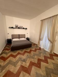 Postel nebo postele na pokoji v ubytování La Casa Nel BORGO