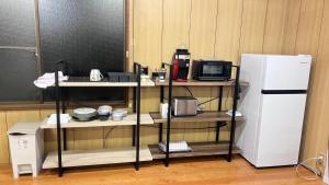 A kitchen or kitchenette at Kitayama Fuji View House
