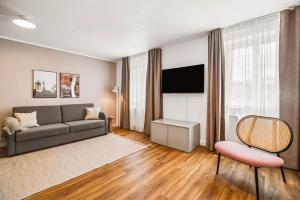 TV a/nebo společenská místnost v ubytování limehome Jena Teichgraben + 22 fotografií