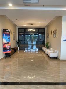 Lobi atau kawasan kaunter penerimaan di Tulip Residence Modern Stay +20 gambar