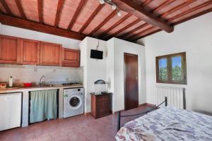 Kuchyň nebo kuchyňský kout v ubytování Podere Al Buraccio - Elba Affitti