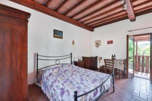 Postel nebo postele na pokoji v ubytování Podere Al Buraccio - Elba Affitti