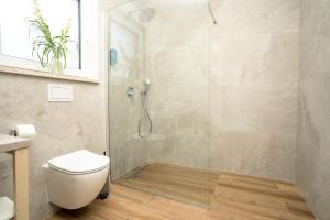 Ein Badezimmer in der Unterkunft VSG Resort - Apartments 200m from Beach, Pool, Sauna & Jacuzzi