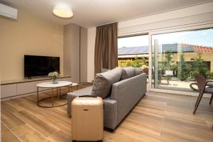 TV/Unterhaltungsangebot in der Unterkunft VSG Resort - Apartments 200m from Beach, Pool, Sauna & Jacuzzi