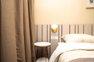 Ein Bett oder Betten in einem Zimmer der Unterkunft VSG Resort - Apartments 200m from Beach, Pool, Sauna & Jacuzzi
