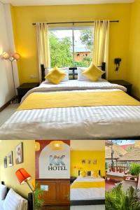 Postel nebo postele na pokoji v ubytování KK Hotel