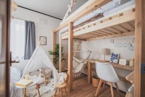 Postel nebo postele na pokoji v ubytování AKIYATO DATE DREAM DATE home