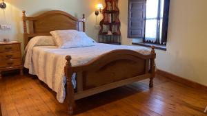 Postel nebo postele na pokoji v ubytování El Corralín