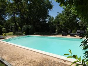 Bazén v ubytování SCAPPO IN UMBRIA, La Casa nel bosco nebo v jeho okolí