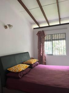 Postel nebo postele na pokoji v ubytování Spacious rooms, Serene location with easy access to Kandy city