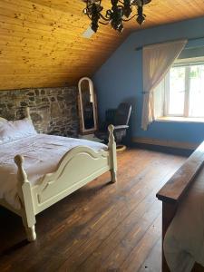 Voodi või voodid majutusasutuse Cloneymore Guest House toas