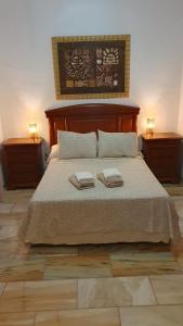 En eller flere senge i et værelse på Casa Con Alma # junto a estación de trenes y muy cerca del centro + 31 billeder