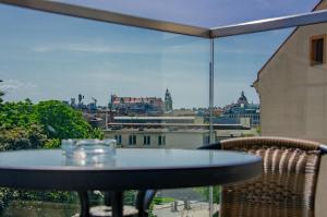 Balkón nebo terasa v ubytování InPoint Apartments G11 near Old Town & Kazimierz District & Parking Option