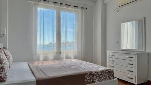 Letto o letti in una camera di Ionian Sea View Apartment