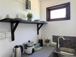 O bucătărie sau chicinetă la Sonora