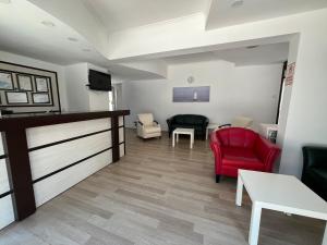 Posezení v ubytování Hotel Status