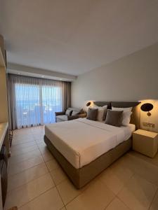 Ένα ή περισσότερα κρεβάτια σε δωμάτιο στο Adriana beach +45 φωτογραφίες