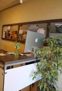 Kuchyň nebo kuchyňský kout v ubytování Hotel Uilenspiegel