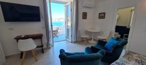 Μια τηλεόραση ή/και κέντρο ψυχαγωγίας στο Immobiliare Turistcasa - Casa Corso Umberto 110