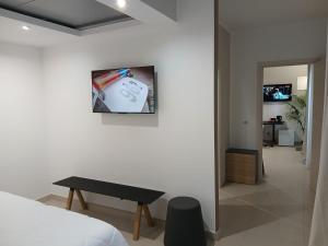 TV a/nebo společenská místnost v ubytování LHI Healthy Hotel Lecce