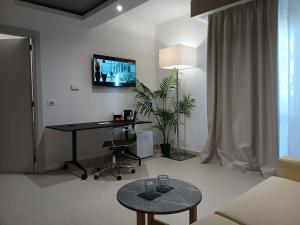 TV a/nebo společenská místnost v ubytování LHI Healthy Hotel Lecce