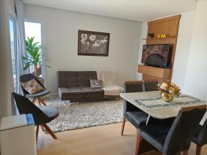 Istumisnurk majutusasutuses Apartamento de temporada em Gramado com linda vista +8 fotot