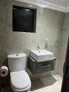 Koupelna v ubytování Greyhouse Lodge