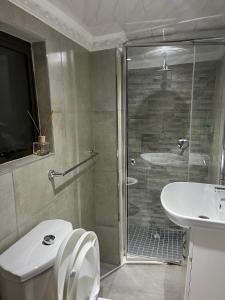 Koupelna v ubytování Greyhouse Lodge + 3 fotografie