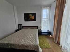 Postel nebo postele na pokoji v ubytování Odisei Large Studio