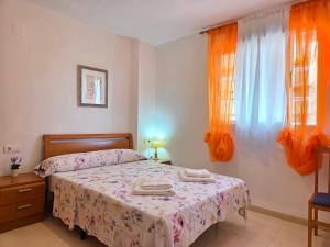 Postel nebo postele na pokoji v ubytování Acapulco 2 primera linea