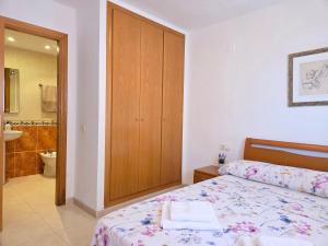 Postel nebo postele na pokoji v ubytování Acapulco 2 primera linea