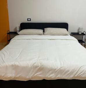 Ένα ή περισσότερα κρεβάτια σε δωμάτιο στο Il Vicoletto II