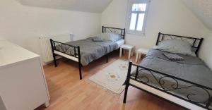 Postel nebo postele na pokoji v ubytování Wohnung Revant West