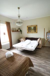 Postel nebo postele na pokoji v ubytování Sveas B&B Ullared